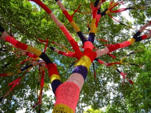 Tree Cozy is a project by Carol Hummel who knitted this tree in front of the Heights Arts in  Cleveland Heights, Ohio.